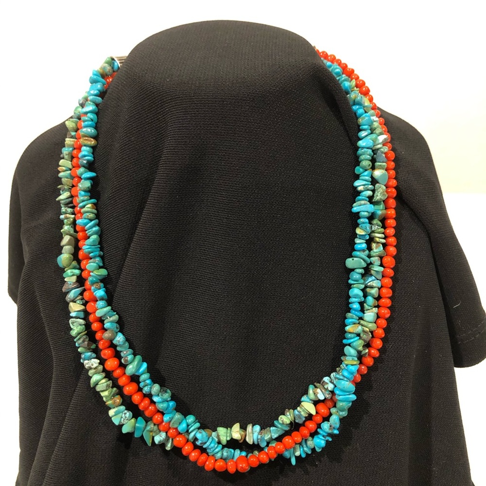 Turquoise and coral strand necklace.